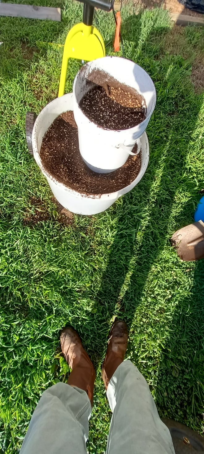 Hydro-Copia soil process with buckets and growing mix